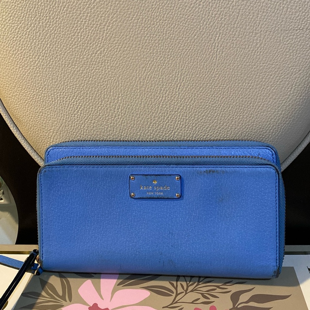 Kate Spade wallet used.